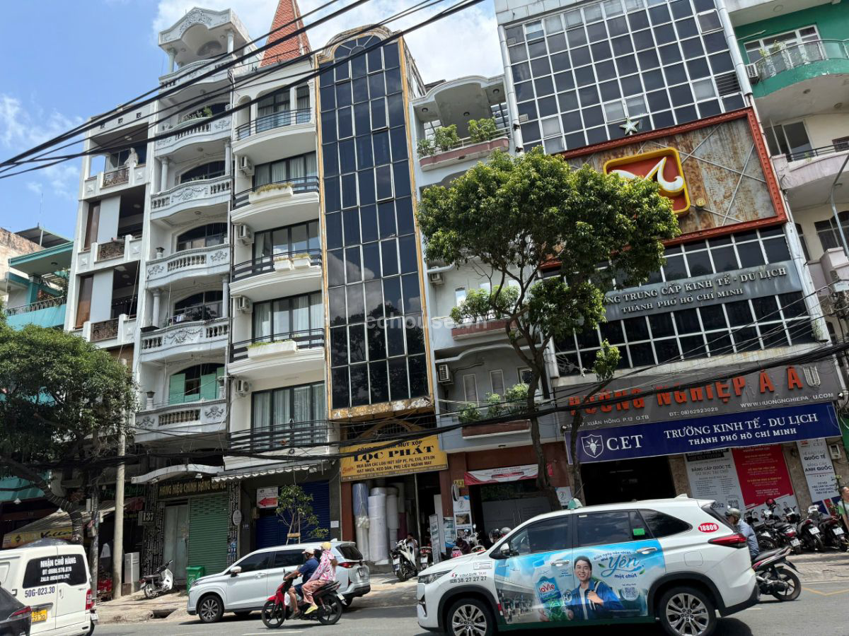 Tòa nhà MT Xuân Hồng, P.Bảy Hiền. DT 4x19m, 7 tầng ST